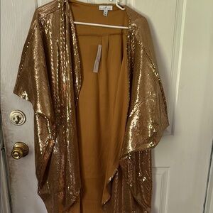 Shavonne Dorsey Gold Sequin Cape with Flowing Silhouette